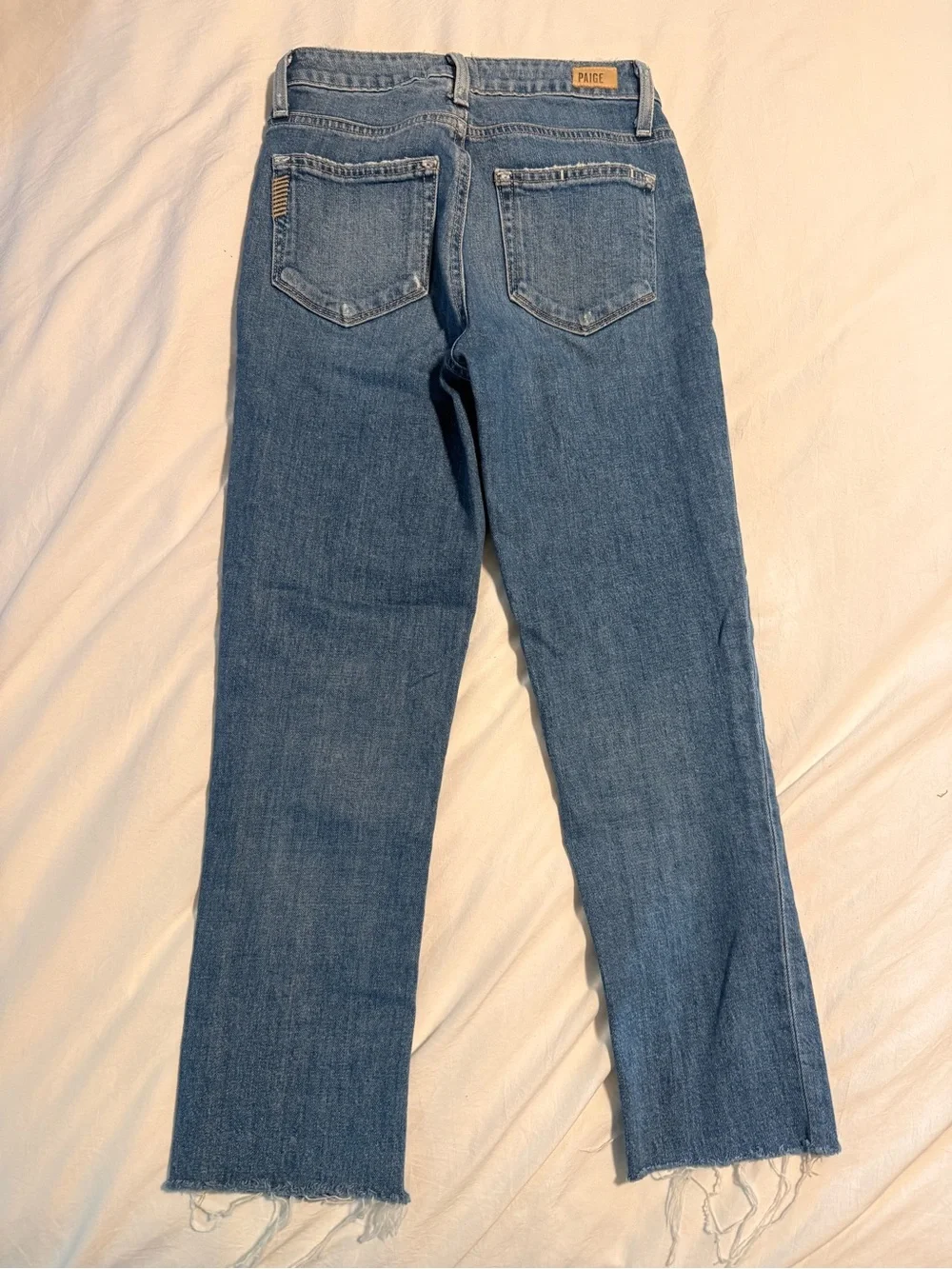 PAIGE Medium Blue Skinny Jeans with Frayed Hem